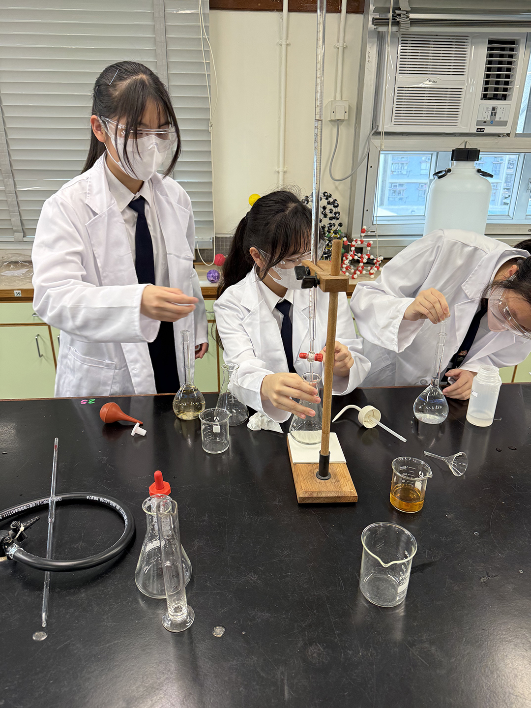 A group of students in a classroomDescription automatically generated